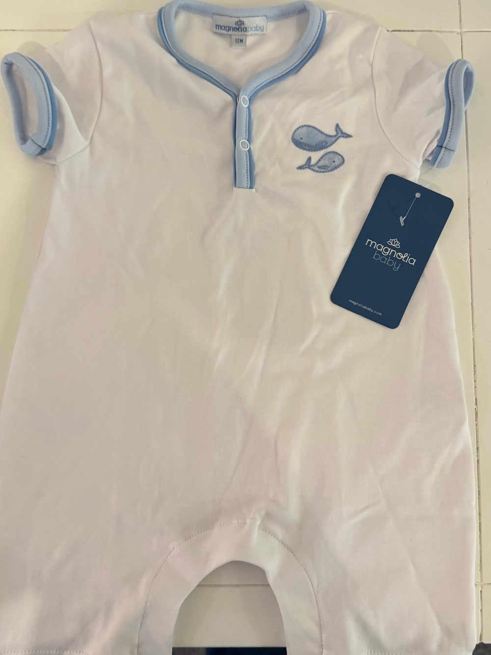 Magnolia Baby White One-Piece with Light Blue Trim